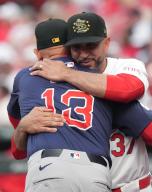 Boston Red Sox manager Alex Cora is embraced by St. Louis Cardinals manager Oliver Marmot during the lineup exchange at home plate before their baseball game at Busch Stadium in St. Louis on Friday, May 17, 2024. Photo by Bill Greenblatt
