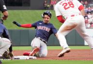 Boston Red Sox David Hamilton slides safely into third base with a two RBI triple in the second inning against the St. Louis Cardinals at Busch Stadium in St. Louis on Friday, May 17, 2024. Photo by Bill Greenblatt