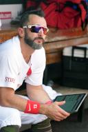 St. Louis Cardinals Matt Carpenter reviews his batting on an I-Pad while sitting in the dugout during a game against the Boston Red Sox at Busch Stadium in St. Louis on Sunday, May 19, 2024. Photo by Bill Greenblatt