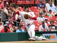 St. Louis Cardinals third baseman Nolan Arenado throws the baseball to third base as he falls down in an attempt to get Boston Red Sox Garrett Cooper in the fourth inning at Busch Stadium in St. Louis on Sunday, May 19, 2024. Photo by Bill Greenblatt