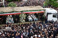 Mourners gather around the coffins during a funeral procession for president Ebrahim Raisi with his foreign minister Hossein Amir-Abdollahian and six others in Tabriz, the capital of Iran