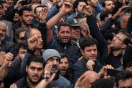 Mourners gather around the coffins during a funeral procession for President Ebrahim Raisi, Foreign Minister Hossein Amir-Abdollahian and six others in Tabriz, the capital of Iran