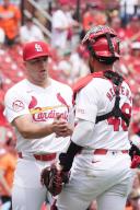 St. Louis Cardinals Pitcher Ryan Helsley and catcher Ivan Herrera congratulate one another after a 3-1 win over the Baltimore Orioles at Busch Stadium in St. Louis on Wednesday, May 22, 2024. The game was a continuation from a rain delayed game, with the teams tied 1-1 in the middle of the sixth inning.on Tuesday, May 21, 2024. Photo by Bill Greenblatt