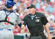 Home Plate Umpire Cory Blaser greets Chicago Cubs catcher Miguel Amaya in the bottom of the first inning during a game against the St. Louis Cardinals at Busch Stadium in St. Louis on Saturday, May 25, 2024. Photo by Bill Greenblatt