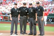 Major League umpires (L to R) Todd Tichenor, Manny Gonzalez, Cory Blazer and Emil Jimenez, pose for a photograph before the the Chicago Cubs-St. Louis Cardinals baseball game at Busch Stadium in St. Louis on Saturday, 25, 2024. Photo by Bill Greenblatt