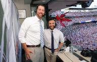Former St. Louis Cardinals pitcher Adam Wainwright (L) and broadcaster Adam Amin take a break during the Chicago Cubs-St. Louis Cardinals baseball game they are doing for the Fox Network at Busch Stadium in St. Louis on Saturday, 25, 2024. Photo by Bill Greenblatt