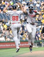 Atlanta Braves outfielder Adam Duvall (14) celebrates his homer in the eighth inning of the Pittsburgh Pirates 8-1 lost to the Atlanta Braves at PNC Park on Sunday May 26, 2024 in Pittsburgh. Photo by Archie Carpenter