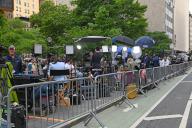 Media crews line the sidewalk for coverage of the trial of former President Donald Trump outside the Manhattan Criminal Courts Building in New York on Thursday, May 30, 2024. Jury deliberations entered the second day in the hush money trial of former president. Photo by Louis Lanzano