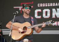 Former St. Louis Cardinals pitcher Adam Wainwright entertains the crowds, singing country music before the start of the World Wide Technology Raceway Enjoy Illinois 300 in Madison, Illinois on Sunday, June 2, 2024. Photo by Bill Greenblatt 