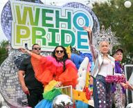Cyndi Lauper (right) waves to the crowds lining the streets at the annual WeHo Pride Parade on Santa Monica Boulevard during festivities kicking off Pride Month in West Hollywood, California on Sunday, June 2, 2024. The singer songwriter is being honored and named Lifetime Ally Icon by WeHo Pride. Photo by Chris Chew