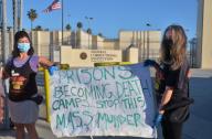 A small group of activists protest outside the Federal Correctional Institution in San Pedro, California on Saturday, May 2, 2020. The American Civil Liberties Union on Saturday filed a pair of class-action lawsuits on behalf of federal prisoners at Lompoc and Terminal Island, claiming that officials mishandled coronavirus outbreaks at the facilities that had infected a combined total of 1,775 inmates, killing 10. File Photo by Jim Ruymen/