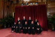 Justices of the US Supreme Court during a formal group photograph at the Supreme Court in Washington, D.C., US, on Friday, Oct. 7, 2022. Seated from left: Associate Justice Sonia Sotomayor, Associate Justice Clarence Thomas, Chief Justice John Roberts, Associate Justice Samuel Alito Jr. and Associate Justice Elena Kagan. Standing from left: Associate Justice Amy Coney Barrett, Associate Justice Neil Gorsuch, Associate Justice Brett Kavanaugh and Associate Justice Ketanji Brown Jackson. Photo by Eric Lee