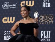 Angela Bassett appears backstage with her award for Best Supporting Actress award for "Black Panther: Wakanda Forever" during the 28th annual Critics