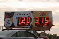 Cars drive by the Lottery display board on Highway 64 in St. Louis on Tuesday, October 3, 2023. The Powerball jackpot is now worth an estimated $1.2 billion with a cash value of $551.7 million, the third largest in history. Photo by Bill Greenblatt