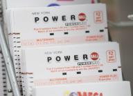 Powerball lottery ticket cards are displayed in a connivence store on Second Avenue in New York City on Monday, October 9, 2023. The estimated $1.55 billion grand prize is now the 3rd largest in history and could potentially be the largest jackpot in Powerball