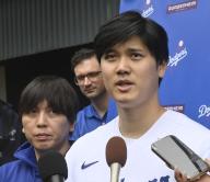 Major League Baseball says it is formally investigating allegations that Ippei Mizuhara (L), the ex-interpreter for Los Angeles Dodgers superstar Shohei Ohtani used $4.5 million of the player
