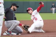 St. Louis Cardinals Nolan Gorman is tagged out at third base by Arizona Diamondbacks Eugenio Suarez, while trying to steal third base in the second inning at Busch Stadium in St. Louis on Tuesday, April 23, 2024. Photo by Bill Greenblatt