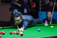 VCG111487783902 HONG KONG, CHINA - MARCH 26: Marco Fu of Chinese Hong Kong plays a shot in the Group B match against Jack Lisowski of England on day two of the 2024 Hong Kong Snooker All-Star Challenge at Queen Elizabeth Stadium on March 26, 2024 in Hong Kong, China. (Photo by Chen Yongnuo/China News Service/VCG 