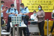 VCG111490529251 HONG KONG, CHINA - APRIL 10: Doctors and police officers work at the interdepartmental assistance station at Queen Elizabeth Hospital on April 10, 2024 in Hong Kong, China. At least five people died and more than 10 people were injured in a fire on April 10 at a residential building, according to Xinhua News Agency. (Photo by Chen Yongnuo/China News Service/VCG 
