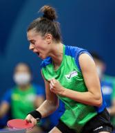 VCG111403926475 CHENGDU, CHINA - OCTOBER 04: Bruna Takahashi of Brazil reacts against Pauline Chasselin of France during the Women\'s Group match between Brazil and France on Day 5 of 2022 ITTF World Team Championships Finals at Chengdu High-tech Sports Centre on October 4, 2022 in Chengdu, Sichuan Province of China. (Photo by VCG