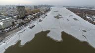 VCG111412141162 HARBIN, CHINA - NOVEMBER 28: Aerial view of the frozen Songhua River in winter on November 28, 2022 in Harbin, Heilongjiang Province of China. (Photo by VCG