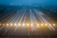 VCG111493436759 NANJING, CHINA - APRIL 29: Aerial view of bullet trains waiting on storage tracks at Nanjing South Railway Station ahead of the upcoming May Day holiday travel rush on April 29, 2024 in Nanjing, Jiangsu Province of China. This year\'s May Day holiday travel rush will last for eight days from April 29 to May 6. (Photo by Fang Dongxu\/VCG