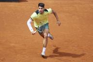 VCG111493510967 MADRID, SPAIN - APRIL 28: Carlos Alcaraz of Spain competes in the Men\'s Singles Round of 32 match against Thiago Seyboth Wild of Brazil on day six of Mutua Madrid Open 2024 at La Caja Magica on April 28, 2024 in Madrid, Spain. (Photo by VCG\/VCG