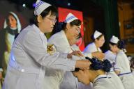 VCG111495117897 YANTAI, CHINA - MAY 08: Nursing students attend a capping ceremony to welcome International Nurses Day at Yantai Nurses School on May 8, 2024 in Yantai, Shandong Province of China. The International Nurses Day falls on May 12. (Photo by Sun Wentan\/VCG