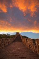 VCG111496386554 BEIJING, CHINA - MAY 14: Sunset glow shines over Mutianyu section of the Great Wall on May 14, 2024 in Beijing, China. (Photo by VCG\/VCG