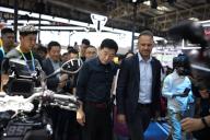 VCG111496618490 BEIJING, CHINA - MAY 17: Great Wall Motors Chairman Wei Jianjun visits BMW booth during the 2024 Beijing International Motorcycle Exhibition (Motor China 2024) at the China International Exhibition Center (Shunyi Hall) on May 17, 2024 in Beijing, China. (Photo by VCG/VCG 