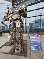 VCG111499457264 WUHAN, CHINA - MAY 30: A 5.5-meter-high robot assembled from discarded parts is on display to raise people