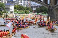 VCG111499820520 YONGZHOU, CHINA - JUNE 02: Dragon boats parade on Xiaoshui River to celebrate the upcoming Dragon Boat Festival on June 2, 2024 in Yongzhou, Hunan Province of China. A total of 212 boats took part in the race, setting a new Guinness World Record on June 2. (Photo by Yang Huafeng/China News Service/VCG 
