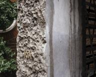Detail of limestone frame cladding showing tool marks. 15 Clerkenwell Close, London, United Kingdom. Architect: Amin Taha Architects, 2024
