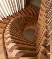 Detail of sculptural curvaceous timber staircase. ACME Offices, London, United Kingdom. Architect: ACME, 2024