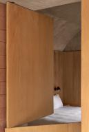 Glimpse of bedroom. Casa Terreno, n/a, Mexico. Architect: Fernanda Canales, 2018