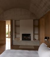 Bedroom with fireplace. Casa Terreno, n/a, Mexico. Architect: Fernanda Canales, 2018