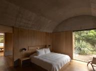Bedroom with garden view. Casa Terreno, n/a, Mexico. Architect: Fernanda Canales, 2018