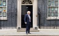 The UK PM Boris Johnson steps from No.10 Downing