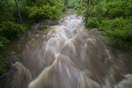 UNITED STATES: May 18, 2018: Heavy rains over the part week that will continue into next week are causing creeks and rivers to overflow their banks. Seen here near the Village of Unison in a roaring Beaverdam Creek. (Photo by Douglas Graham/Loudoun Now)