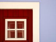 Wooden door with paned window