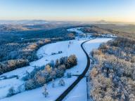 Germany, Baden-Wurttemberg, Aerial view of road in snow-coveredÂ Remstal valley