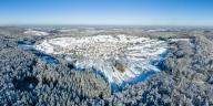 Germany, Baden-Wurttemberg, Aerial panorama of Swabian-Franconian Forest in winter