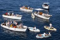 Italy, Capri, boat with tourists waiting before Blue Grotto