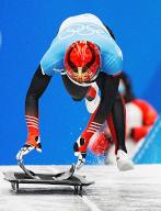 (220211) -- BEIJING, Feb. 11, 2022 (Xinhua) -- Yin Zheng of China competes during skeleton men heat of Beijing 2022 Winter Olympics at National Sliding Centre in Yanqing District, Beijing, capital of China, Feb. 11, 2022. (Xinhua/He Changshan