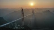 (230129) -- LONGLI, Jan. 29, 2023 (Xinhua) -- This aerial photo taken on Jan. 29, 2023 shows the Longlihe Bridge in Longli County, southwest China\'s Guizhou Province. The 1,260-meter-long bridge is under construction. (Xinhua\/Yang Wenbin