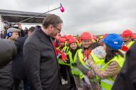 (230402) -- BELGRADE, April 2, 2023 (Xinhua) -- Serbian President Aleksandar Vucic (front) attends the opening ceremony of a highway section in Belgrade, Serbia, April 1, 2023. A highway section linking New Belgrade to Surcin of Serbia was opened for traffic on Saturday. The section, a part of the E-763 highway, is around 8-kilometer long and has three lanes in each direction, a five-meter dividing strip, two-meter-wide pedestrian paths, and bicycle lanes. The construction of the section began in March 2021 and was conducted by the China Communications Construction Company (CCCC). (Xinhua\/Shi Zhongyu