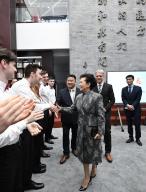 (240328) -- BEIJING, March 28, 2024 (Xinhua) -- Peng Liyuan, wife of Chinese President Xi Jinping, receives a warm welcome from teachers and students at Beijing No.35 High School in Beijing, capital of China, March 28, 2024. Peng met on Thursday with representatives of students and teachers from the Chinese Choir of the Burg Gymnasium, a German high school, at Beijing No.35 High School. (Xinhua\/Xie Huanchi