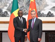 (240328) -- BEIJING, March 28, 2024 (Xinhua) -- Chinese Foreign Minister Wang Yi, also a member of the Political Bureau of the Communist Party of China Central Committee, meets with Beninese Foreign Minister Shegun Adjadi Bakari in Beijing, capital of China, March 28, 2024. (Xinhua\/Shen Hong