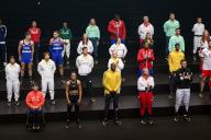 (240419) -- PARIS, April 19, 2024 (Xinhua) -- Athletes pose during an Adidas promotional event to unveil athletes\' outfits for Paris 2024 Olympics and Paralympics in Paris, France, on April 18, 2024. (Photo by Julien Mattia\/Xinhua