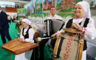 (240419) -- MINSK, April 19, 2024 (Xinhua) -- Exhibitors showcase traditional music during the international fair of tourism services Leisure 2024 in Minsk, Belarus, April 18, 2024. The event will last till April 20. (Photo by Henadz Zhikov\/Xinhua